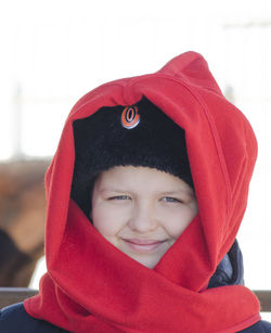 Portrait of smiling boy wearing warm clothing outdoors