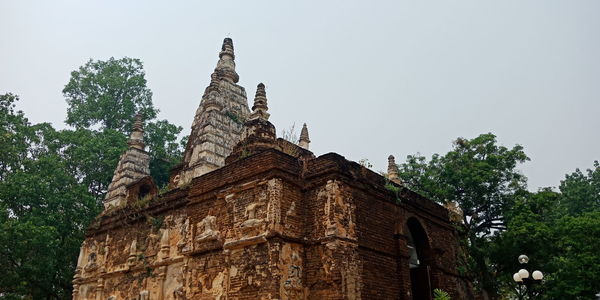 Low angle view of old building against sky