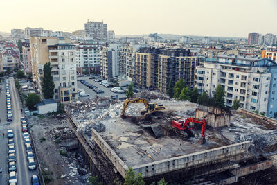 High angle view of buildings against sky in city