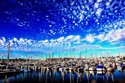 View of harbor against blue sky