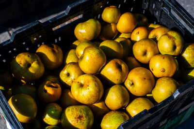 Close-up of apples for sale at market stall