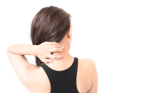 Portrait of young woman over white background