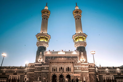 Low angle view of al-haram mosque against sky