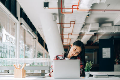 Woman working on laptop