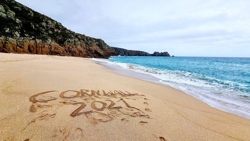 Scenic view of beach against sky