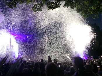 People enjoying music concert