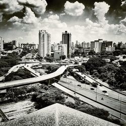 City street against cloudy sky