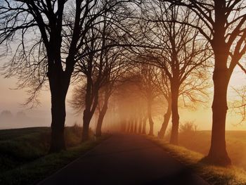 Empty road at sunset