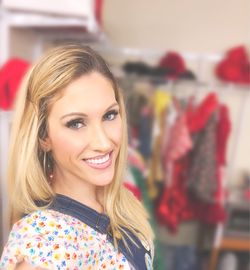 Portrait of smiling woman in dressing room