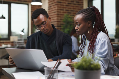 Business colleagues working at office