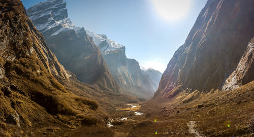 Scenic view of mountains against sky during winter