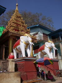 Statue of temple against sky