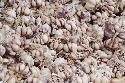 Full frame shot of onions for sale in market