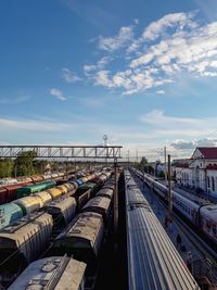 Train on railroad tracks against sky