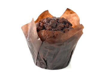 Close-up of chocolate cake against white background