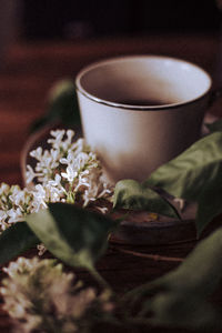 Close-up of coffee cup on table