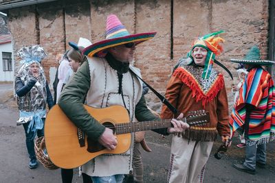 Group of people playing guitar