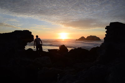 Scenic view of sea at sunset