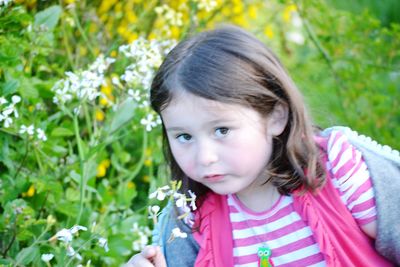 Portrait of cute girl looking away