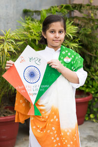 Portrait of a girl standing outdoors