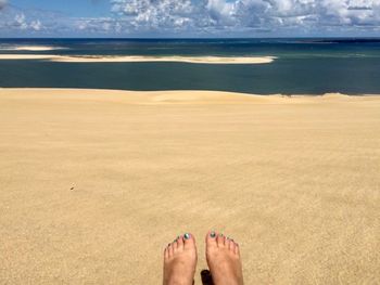 Low section of person legs on beach