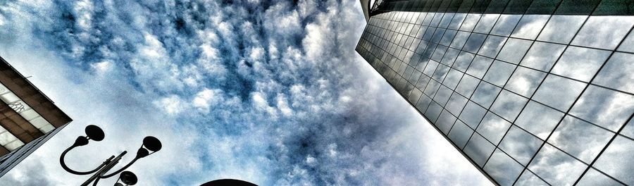 Low angle view of skyscrapers against sky