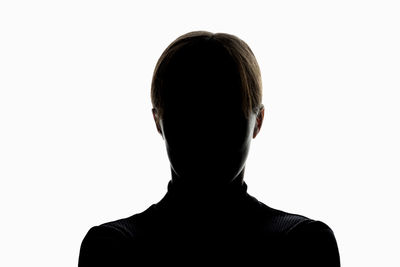 Rear view of silhouette man against white background