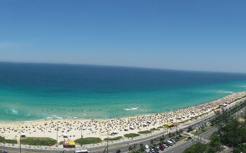 Panoramic view of sea against blue sky