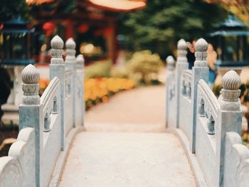 Close-up of seats on table by street