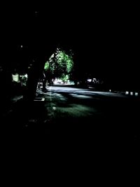 View of illuminated street at night