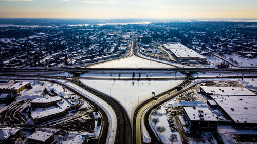 High angle view of highway and buildings in city