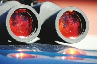 Close-up of binoculars on table