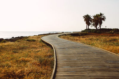 Scenic view of beach against clear sky