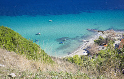 High angle view of beach against blue sky