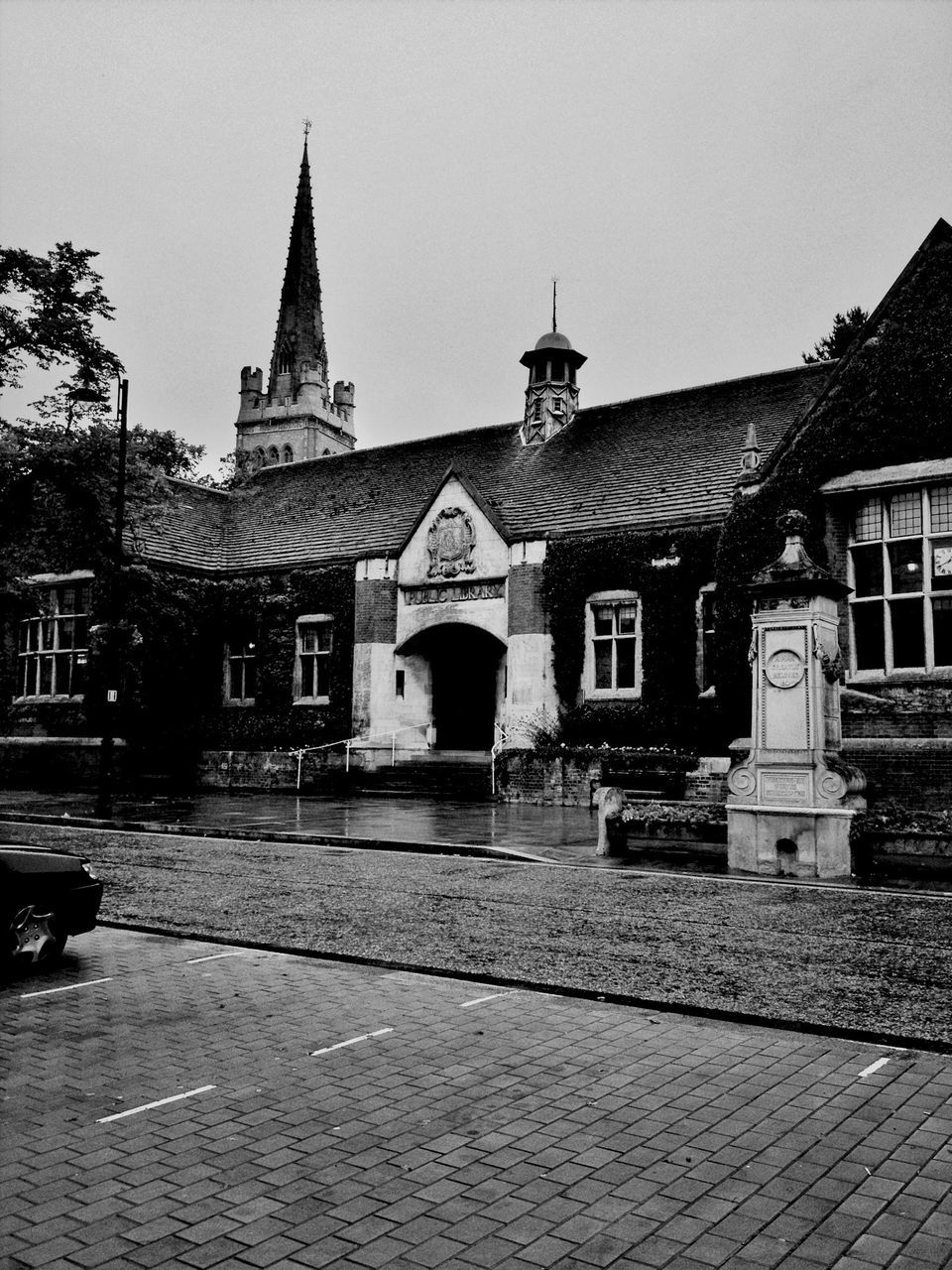 building exterior, architecture, built structure, religion, church, place of worship, spirituality, clear sky, street, facade, cobblestone, road, outdoors, sky, house, history, day, city