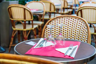 Empty chairs and table in restaurant