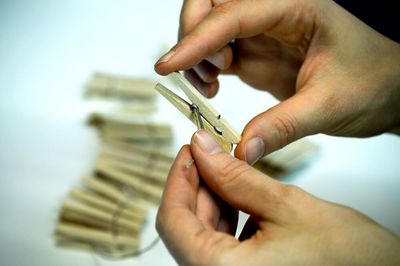 Cropped image of hand holding guitar