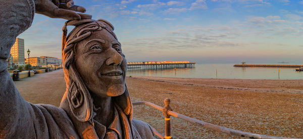 Close-up of statue against sky