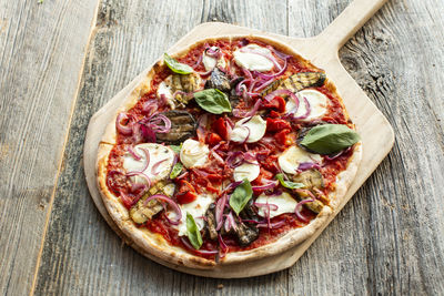 High angle view of pizza on table