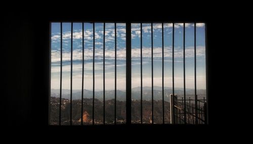 View of cityscape through window