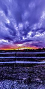 Scenic view of landscape against sky during sunset