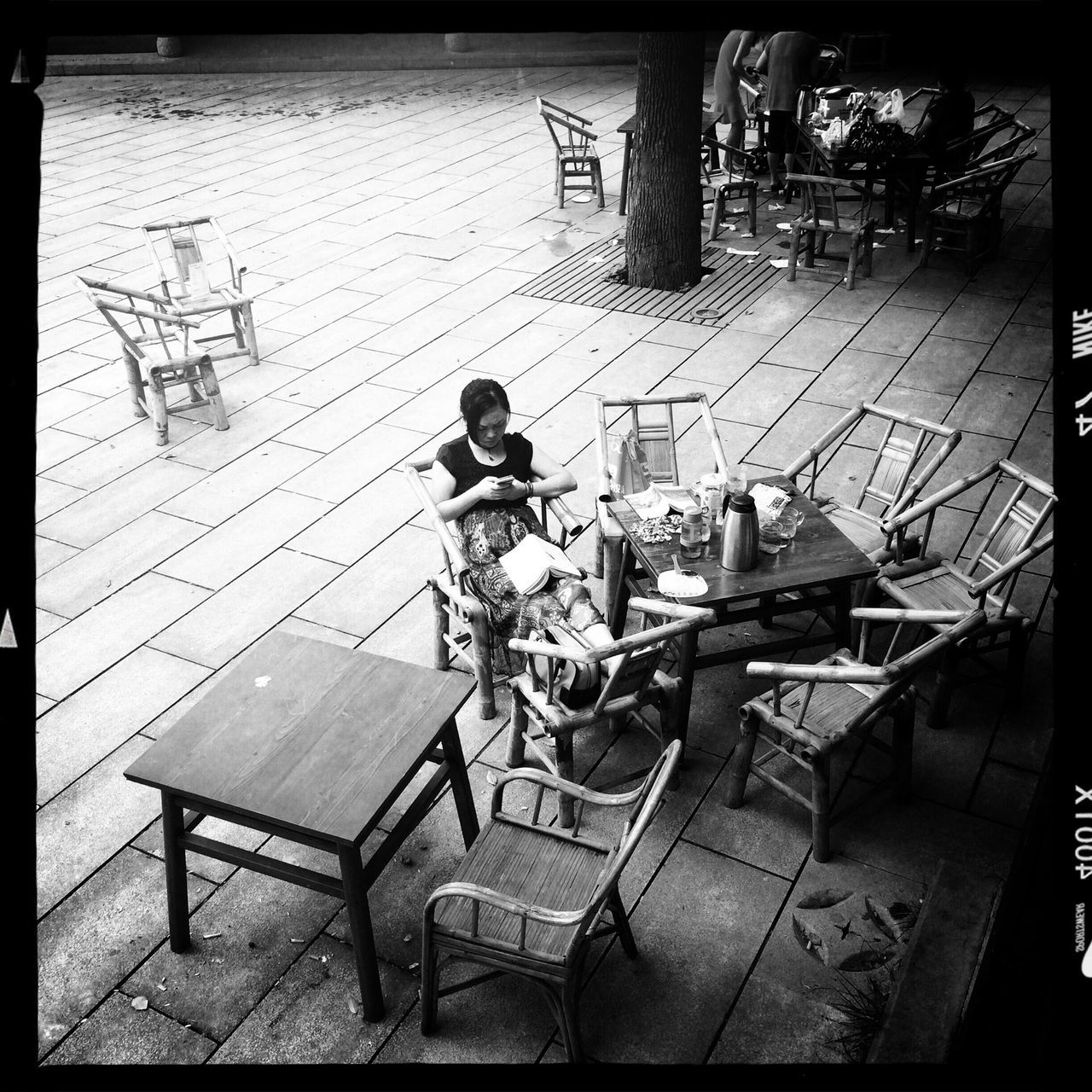 transfer print, auto post production filter, chair, empty, absence, bench, seat, shadow, sunlight, table, transportation, day, bicycle, architecture, built structure, building exterior, sidewalk, land vehicle, house, outdoors