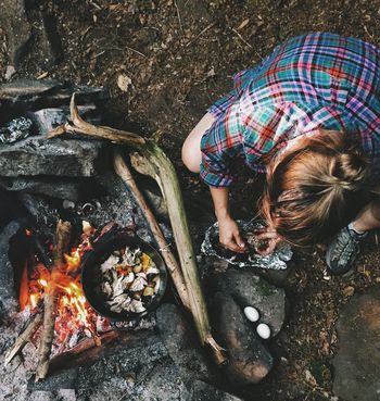 High angle view of woman cooking