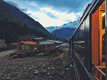 Train on railroad track against sky