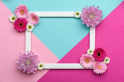 Close-up of pink flowers on table