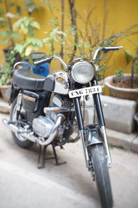 Close-up of bicycle parked on street