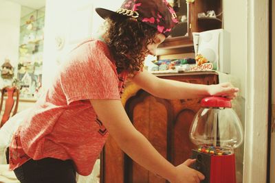 Side view of woman with christmas decorations