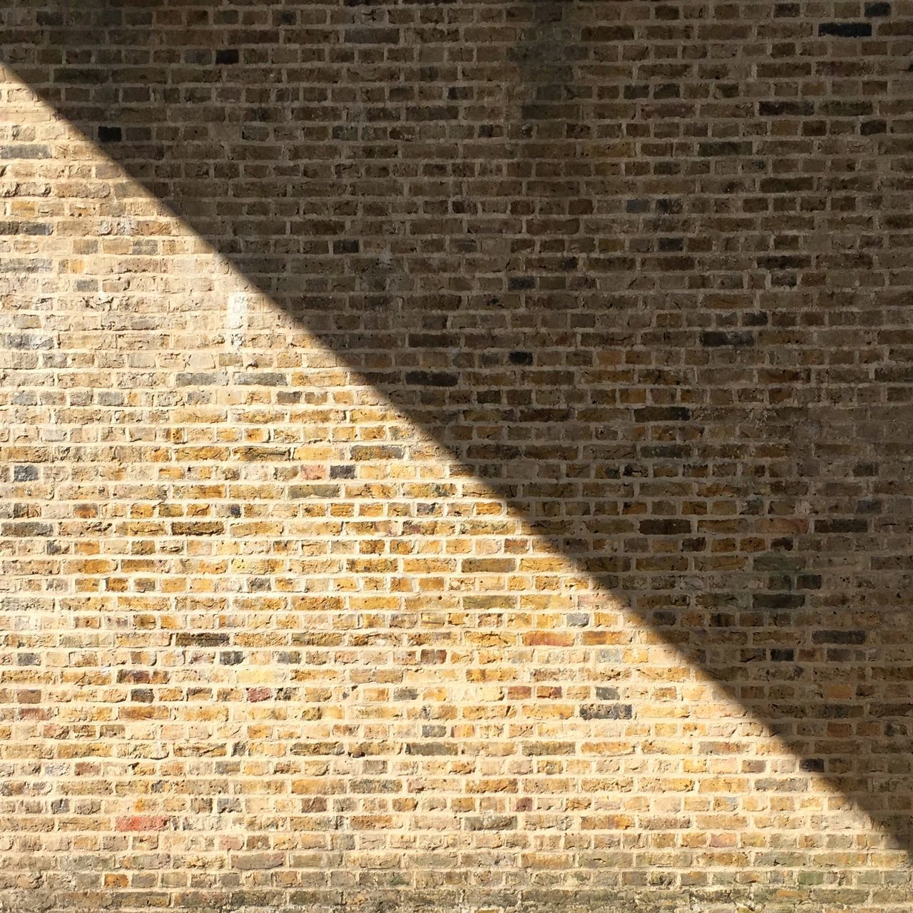 SHADOW OF BRICK WALL