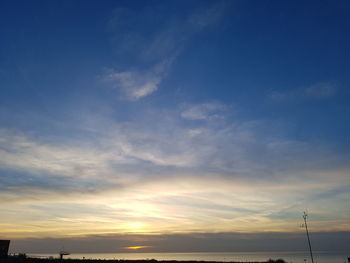 Low angle view of cloudy sky during sunset