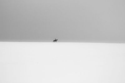 Scenic view of snow against clear sky